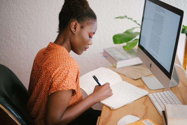Remote-working-lady-pexels-retha-ferguson-3059745-scaled